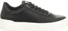 A side view of a black sneaker with a white sole. Náhled obrázku produktu