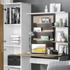 A modern desk setup featuring a laptop, lamp, and storage shelves, with books and decorative items. Anteprima dell’immagine prodotto