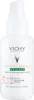 A white bottle of Vichy Capital Soleil UV Clear Anti-Imperfections Fluid with a pump dispenser. Anteprima dell’immagine prodotto