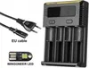 A battery charger and its accessories are displayed against a white background. Produktbild-Vorschau