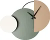 A modern, abstract wall clock with overlapping circular shapes. Produktbild-Vorschau