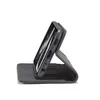 A black leather phone case is shown in a side profile, propped open to display a phone screen. Produktbild-Vorschau