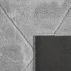 Close-up view of a gray rug, showing its texture and backing. Anteprima dell’immagine prodotto