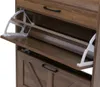A close-up view of a wooden shoe cabinet with two open flip-out drawers. Podgląd zdjęcia produktu