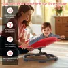 A mother and child are playing indoors with a red sensory spinning chair. Produktbild-Vorschau