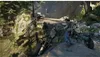 A person on a motorcycle on a damaged road. Produktbild-Vorschau