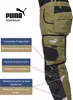 A close-up view of work trousers with feature callouts. Produktbild-Vorschau