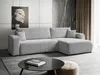 A modern living room scene with a light gray sectional sofa, a black coffee table, and abstract art on the wall. Produktbild-Vorschau
