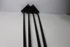 Four black hairpin legs are arranged diagonally on a white surface, with their mounting plates at the top. Produktbild-Vorschau