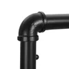 Close-up of a black pipe elbow fitting. Náhled obrázku produktu