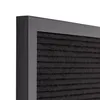 A close-up view of the corner of a black felt letter board with a dark gray frame. Produktbild-Vorschau