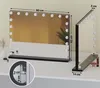 A vanity mirror with LED lights is displayed on a white surface, with dimensions indicated by measurement lines and text. Produktbild-Vorschau