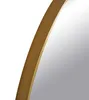 A close-up view of the edge of a round mirror with a gold-colored frame. Náhled obrázku produktu