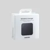 A white product box for a wireless charger against a light gray background. Produktbild-Vorschau