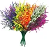 A bouquet of artificial flowers in various colors. Produktbild-Vorschau