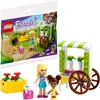 A LEGO Friends flower cart playset shown in its packaging, with the assembled product and minifigures displayed separately. Náhled obrázku produktu