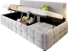 A bed with its storage compartment open, showing stored items. Produktbild-Vorschau