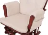 Close-up view of a cream-colored fabric recliner chair with a dark wooden frame. Voir les images du produit