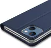 Close-up of a blue flip case for an iPhone 13 Mini, showing the camera cutout and the metallic edge of the case. Produktbild-Vorschau
