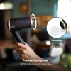 A hand holding a black and gold hairdryer with a close-up inset showing a detachable nozzle. Náhled obrázku produktu