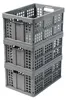 Three stacked grey folding crates. Produktbild-Vorschau