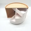 A white and natural wood jewelry organizer with three tiered drawers. Náhled obrázku produktu
