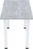 A table with a gray marble-like top and white legs, isolated on a white background. Náhled obrázku produktu