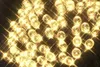 A close-up, sparkling view of many small, round, yellow lights. Podgląd zdjęcia produktu