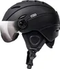 A black ski helmet with a visor, shown from a side angle against a white background. Náhľad obrázku produktu
