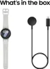 A Samsung Galaxy Watch and its charging cable are displayed against a white background. Náhled obrázku produktu