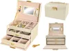 Collage of images showing a beige jewelry box from different angles, including closed, open, and with drawers pulled out. Podgląd zdjęcia produktu