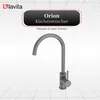A modern kitchen faucet is shown against a grid-like background. Produktbild-Vorschau