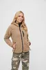 A woman wearing a camel-colored teddy fleece jacket and camouflage pants, posing against a white background. Produktbild-Vorschau
