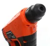 A close-up view of the front of an orange and black power tool. Podgląd zdjęcia produktu