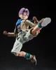 An action figure of Trunks from Dragon Ball GT in a dynamic pose, mid-kick, against a black background. Voir les images du produit