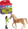 A toy horse and rider set with its packaging. Voir les images du produit