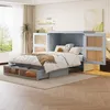 A bedroom with a murphy bed pulled out, showing storage drawers and rattan-fronted cabinets. Anteprima dell’immagine prodotto