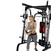 A woman is using a multi-gym machine. Produktbild-Vorschau