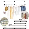 A collage of images showing industrial-style wall-mounted clothing racks in various configurations and sizes, with some images displaying clothing and accessories. Produktbild-Vorschau