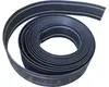 A coiled roll of black plastic edging with gray stripes. Anteprima dell’immagine prodotto