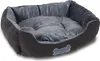 A dog bed with raised sides and a plush interior. Produktbild-Vorschau