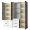 A modern white vitrine with glass doors and open shelves, illuminated by LED lights. Voir les images du produit