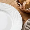 8er-Set Premium Porzellan Speiseteller Ø26 cm – Elegantes Rillendesign in edlem Weiß Produktbild-Vorschau