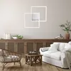 A living room scene with a sofa, chair, coffee table, and a credenza. Produktbild-Vorschau