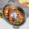 A roast with vegetables cooking in an oval roaster with a glass lid. Náhled obrázku produktu