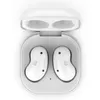 A pair of white wireless earbuds in an open white charging case, viewed from directly above. Produktbild-Vorschau