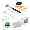 A collection of items for a Zen garden kit, including tools, decorative elements, and materials, laid out on a white background. Náhled obrázku produktu
