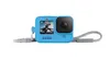 A blue GoPro camera with a wrist strap attached, shown against a white background. Anteprima dell’immagine prodotto