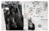 A close-up view of the internal mechanisms of a sewing machine, showing threads and mechanical parts. Anteprima dell’immagine prodotto