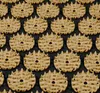 A close-up, overhead view of a beige acupressure mat with many circular rosettes, each with small spikes. Náhľad obrázku produktu